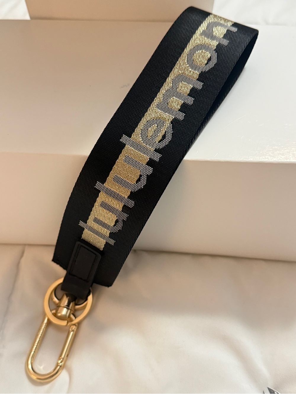 Lululemon Black and Gold Key Strap -